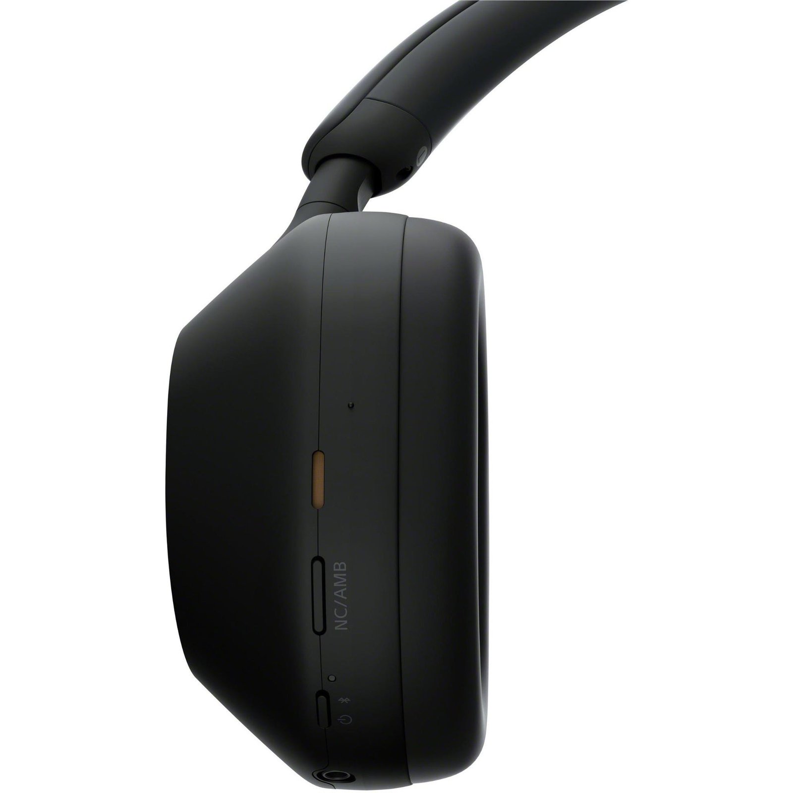 Sony WH-1000XM5 black earcup controls and connection detail.